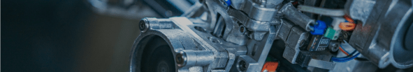 Close up details of industrial automated machinery and complex electrical wire harness assemblies
