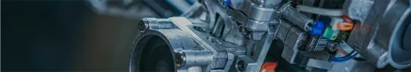 Close up details of industrial automated machinery and complex electrical wire harness assemblies